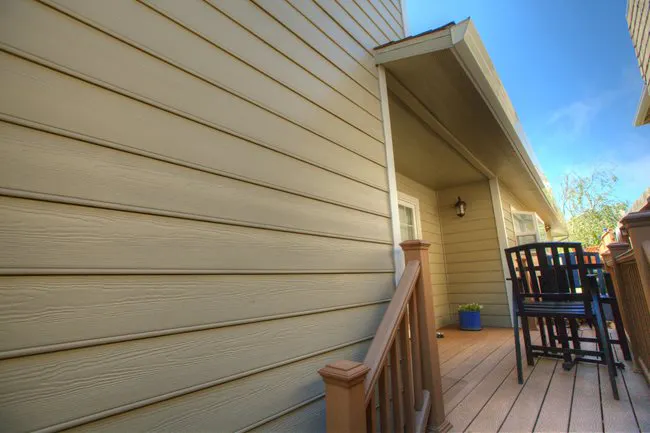 Photo of house before stucco replacement | Signs your home needs stucco replacement | Kenny Construction